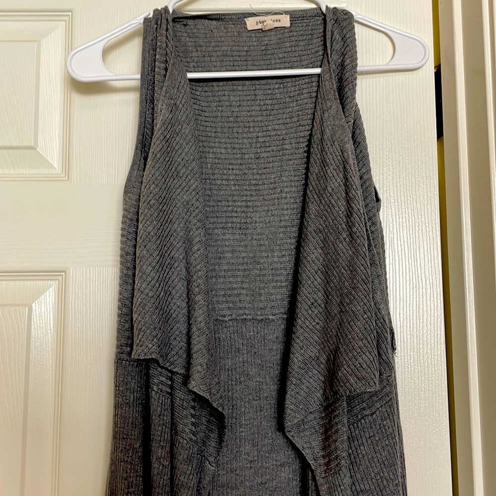 Sleeveless long sweater